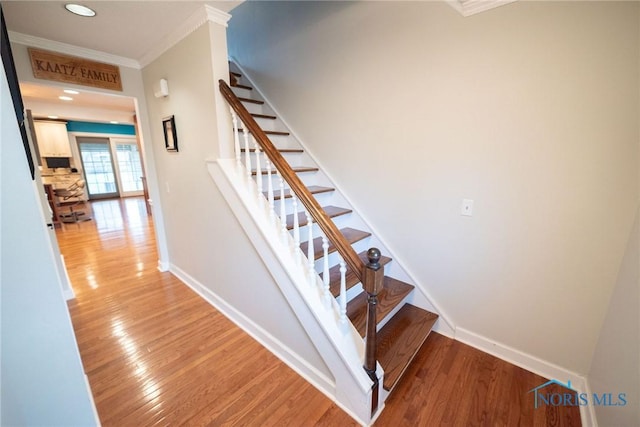 6975 Ramblehurst Rd, Sylvania, OH 43560 - staircase with ornamental molding, wood finished floors, and recessed lighting