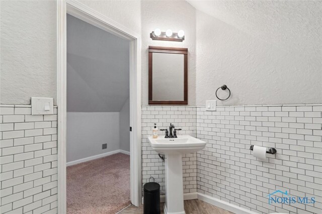 2707 Gunckel Blvd, Toledo, OH 43606 - bathroom with lofted ceiling and a sink