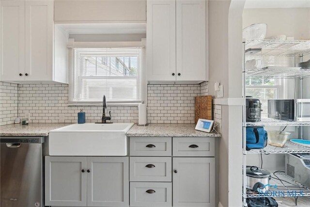 2707 Gunckel Blvd, Toledo, OH 43606 - kitchen with dishwasher, tasteful backsplash, and plenty of natural light
