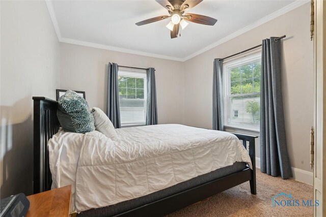 2707 Gunckel Blvd, Toledo, OH 43606 - carpeted bedroom featuring ornamental molding and a ceiling fan