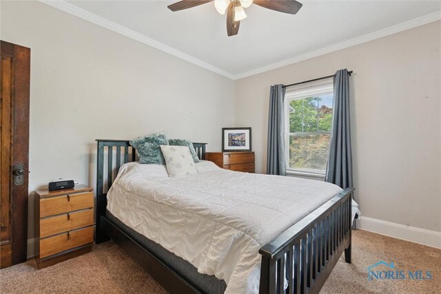 2707 Gunckel Blvd, Toledo, OH 43606 - carpeted bedroom featuring ornamental molding and ceiling fan