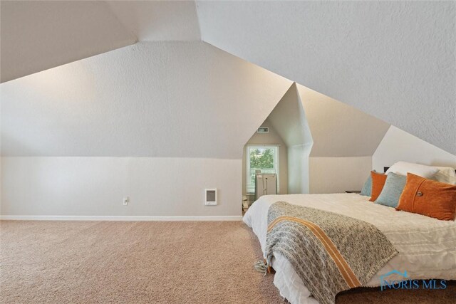 2707 Gunckel Blvd, Toledo, OH 43606 - carpeted bedroom with lofted ceiling and heating unit