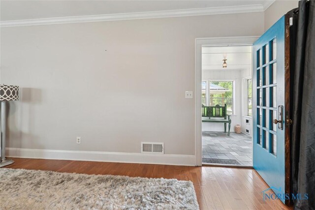 2707 Gunckel Blvd, Toledo, OH 43606 - entryway with wood finished floors and ornamental molding