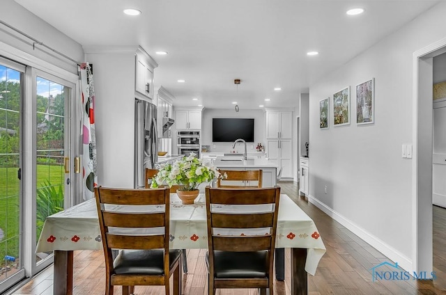 2709 Derby Rd, Ottawa Hills, OH 43615 - dining space featuring wood finished floors and recessed lighting