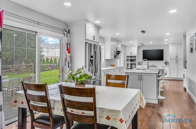 2709 Derby Rd, Ottawa Hills, OH 43615 - dining space with dark wood finished floors and recessed lighting