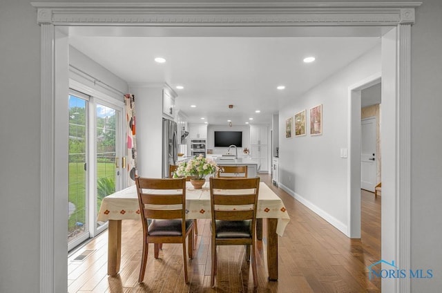 2709 Derby Rd, Ottawa Hills, OH 43615 - dining space with wood finished floors and recessed lighting