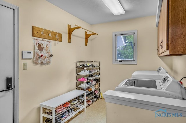 2709 Derby Rd, Ottawa Hills, OH 43615 - washroom featuring cabinet space and separate washer and dryer