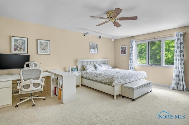 2709 Derby Rd, Ottawa Hills, OH 43615 - bedroom featuring track lighting, light carpet, an office area, and a ceiling fan