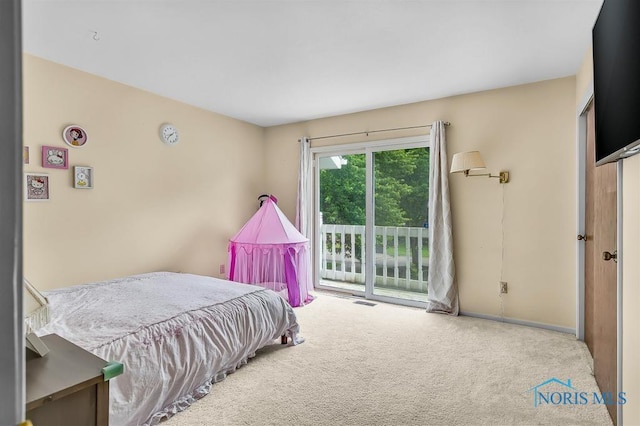 2709 Derby Rd, Ottawa Hills, OH 43615 - carpeted bedroom featuring access to outside and baseboards