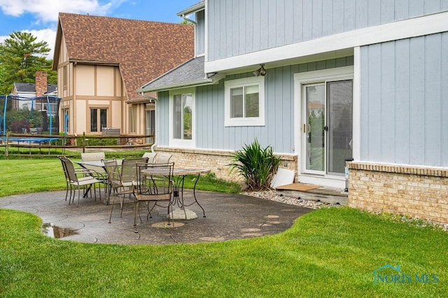 2709 Derby Rd, Ottawa Hills, OH 43615 - view of patio / terrace featuring a trampoline