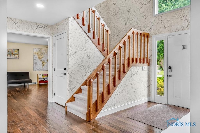 2709 Derby Rd, Ottawa Hills, OH 43615 - foyer with wallpapered walls, stairs, hardwood / wood-style floors, and recessed lighting