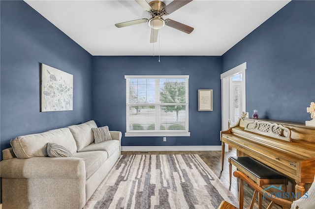 9211 Stable Creek Ct, Sylvania, OH 43560 - living area with wood finished floors and ceiling fan
