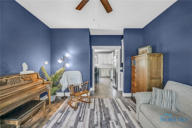 9211 Stable Creek Ct, Sylvania, OH 43560 - sitting room with wood finished floors and ceiling fan