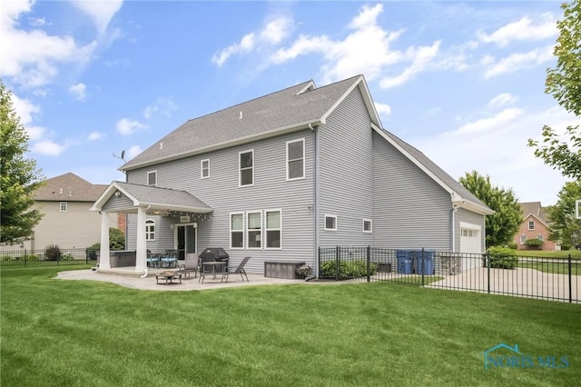 9211 Stable Creek Ct, Sylvania, OH 43560 - rear view of property featuring a patio area, a fire pit, and an attached garage