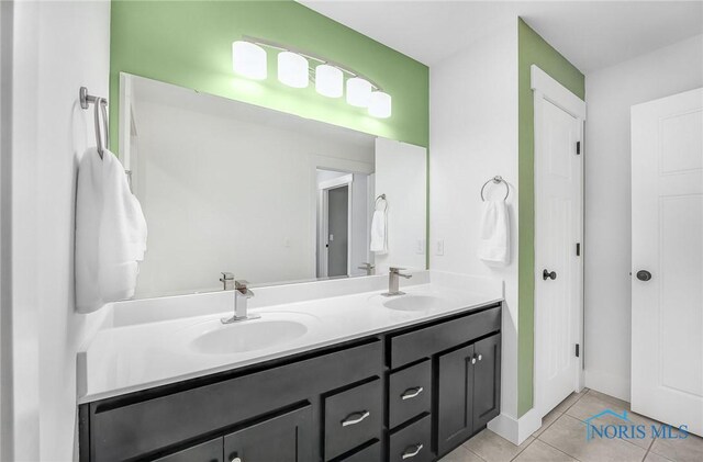 9211 Stable Creek Ct, Sylvania, OH 43560 - full bath with double vanity and tile patterned flooring