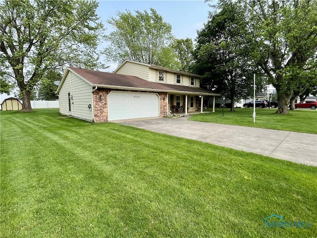 6312 Meadowlark Ln, Payne, OH 45880 - view of front of house with a garage, concrete driveway, stone siding, a porch, and roof with shingles