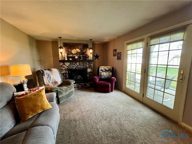 6312 Meadowlark Ln, Payne, OH 45880 - carpeted living area featuring a stone fireplace