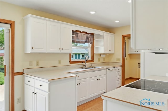 642 Edith Ave, Findlay, OH 45840 - kitchen with white dishwasher, white cabinetry, light countertops, and recessed lighting