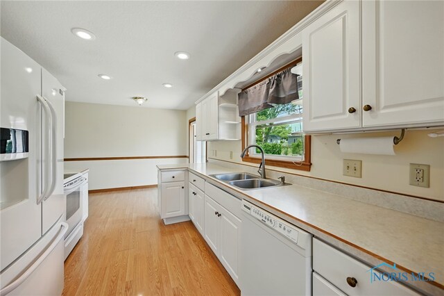 642 Edith Ave, Findlay, OH 45840 - kitchen with white appliances, light wood-type flooring, open shelves, white cabinetry, and recessed lighting