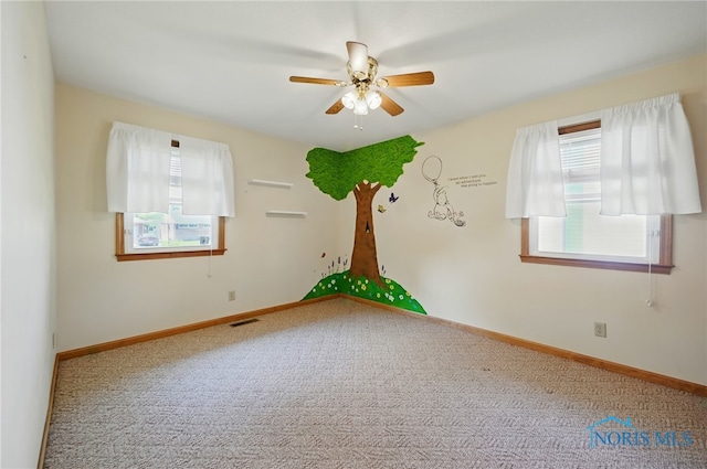 642 Edith Ave, Findlay, OH 45840 - empty room with carpet and ceiling fan