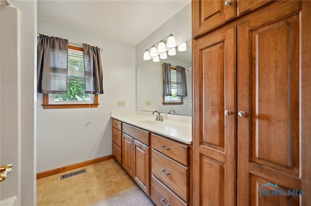 642 Edith Ave, Findlay, OH 45840 - bathroom with vanity and baseboards