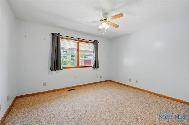 642 Edith Ave, Findlay, OH 45840 - carpeted spare room with a ceiling fan and baseboards