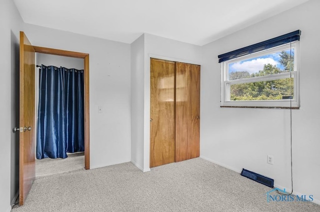 5022 Stengel Ave, Toledo, OH 43614 - unfurnished bedroom featuring carpet flooring and a closet
