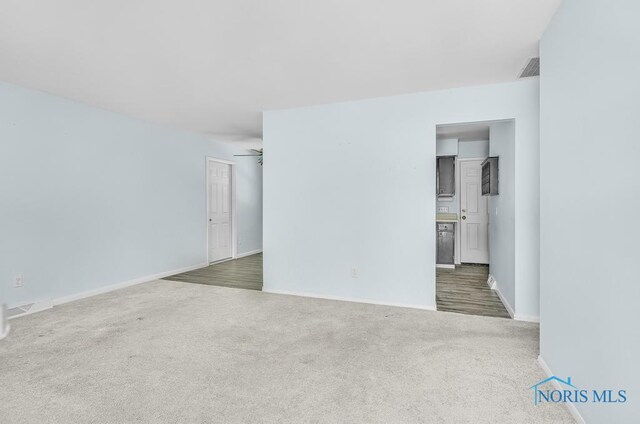 5022 Stengel Ave, Toledo, OH 43614 - unfurnished room with carpet floors and baseboards