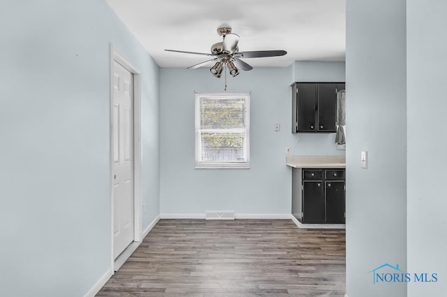 5022 Stengel Ave, Toledo, OH 43614 - unfurnished dining area with ceiling fan and wood finished floors