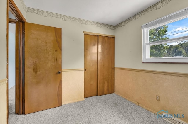 5022 Stengel Ave, Toledo, OH 43614 - unfurnished bedroom featuring carpet floors and a closet