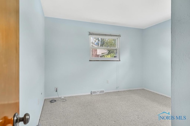 5022 Stengel Ave, Toledo, OH 43614 - unfurnished room with carpet flooring and baseboards