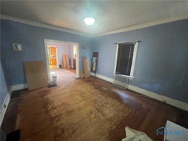 1048 Hawk St, Toledo, OH 43612 - unfurnished room featuring wood finished floors and ornamental molding