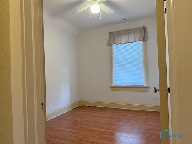 831 Butler St, Toledo, OH 43605 - empty room featuring wood finished floors and a ceiling fan