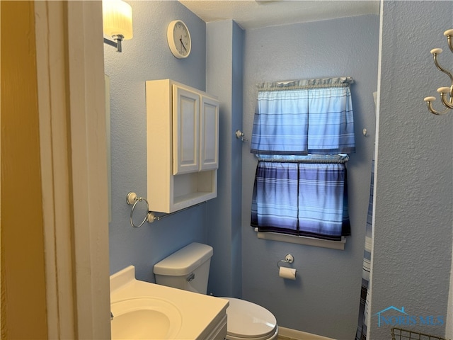 831 Butler St, Toledo, OH 43605 - bathroom featuring toilet and vanity