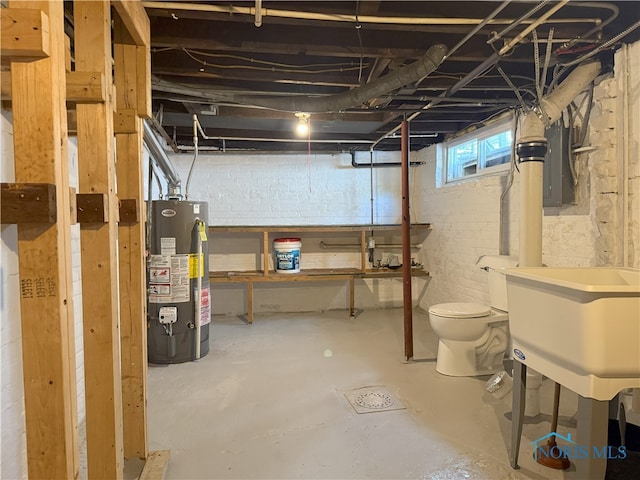 831 Butler St, Toledo, OH 43605 - basement featuring gas water heater and electric panel