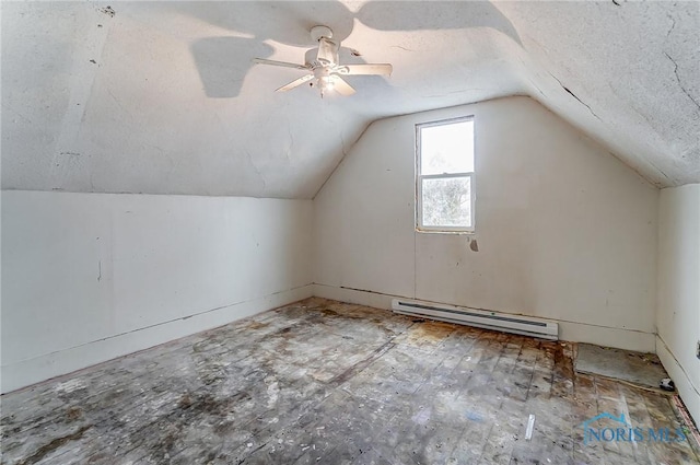 225 2nd St, Latty, OH 45855 - bonus room featuring a baseboard radiator, vaulted ceiling, a ceiling fan, and a textured ceiling