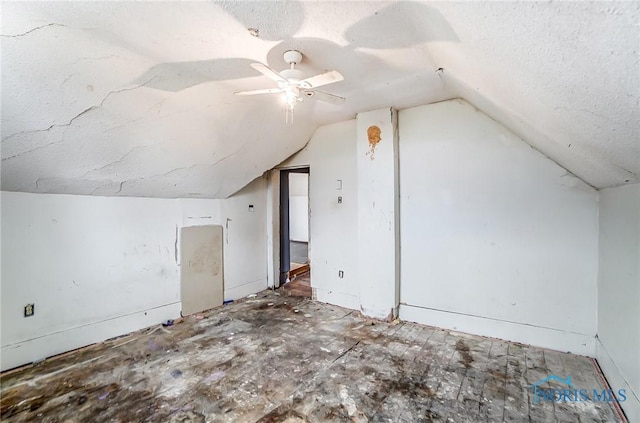 225 2nd St, Latty, OH 45855 - additional living space with vaulted ceiling, a textured ceiling, and ceiling fan