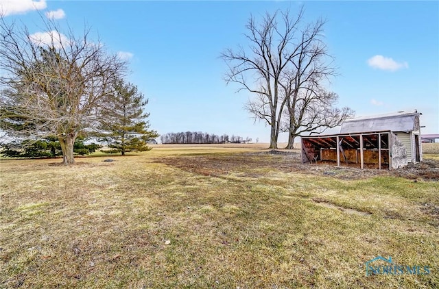 225 2nd St, Latty, OH 45855 - view of green lawn with an outbuilding