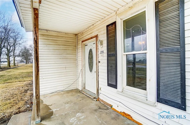 225 2nd St, Latty, OH 45855 - property entrance featuring covered porch