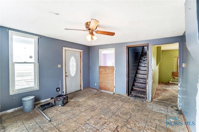 225 2nd St, Latty, OH 45855 - foyer entrance with plenty of natural light, stairway, and a ceiling fan