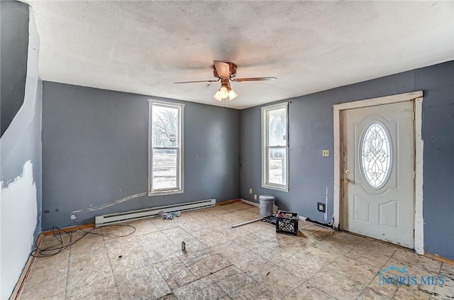 225 2nd St, Latty, OH 45855 - entryway with a baseboard heating unit and a ceiling fan