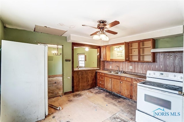 225 2nd St, Latty, OH 45855 - kitchen with white appliances, a ceiling fan, under cabinet range hood, brown cabinets, and open shelves