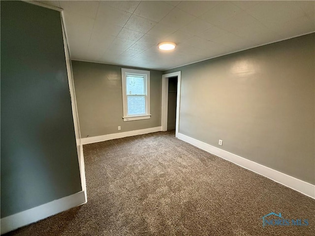 223 E Leggett St, Wauseon, OH 43567 - carpeted spare room featuring baseboards