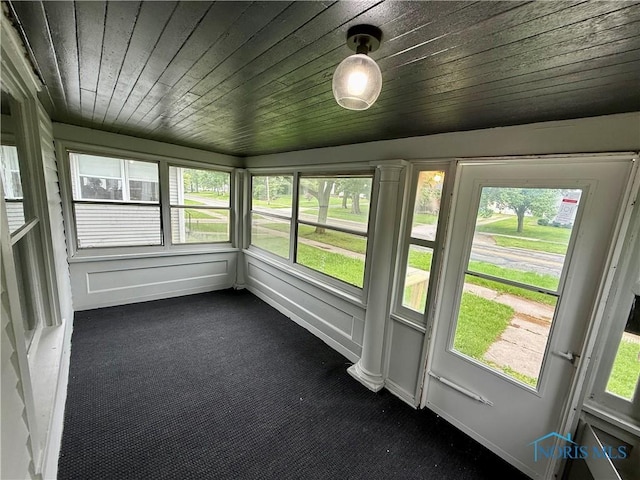 223 E Leggett St, Wauseon, OH 43567 - unfurnished sunroom with carpet flooring and wood ceiling