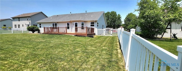 149 Carlee Ln, Findlay, OH 45840 - rear view of property featuring a fenced backyard, a wooden deck, and a gate