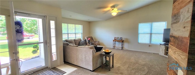 149 Carlee Ln, Findlay, OH 45840 - living room featuring healthy amount of natural light, lofted ceiling, a ceiling fan, and light carpet