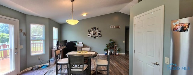 149 Carlee Ln, Findlay, OH 45840 - dining room with dark wood-style floors, vaulted ceiling, and a desk