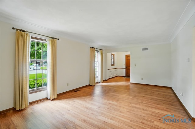 1110 Bourgogne Ave, Bowling Green, OH 43402 - empty room with light wood finished floors and crown molding