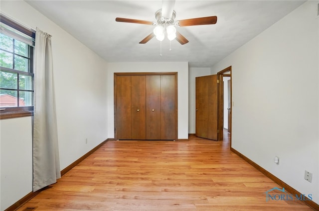 1110 Bourgogne Ave, Bowling Green, OH 43402 - unfurnished bedroom featuring light wood-style floors, a closet, and ceiling fan