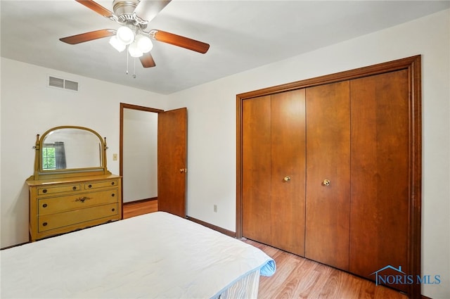 1110 Bourgogne Ave, Bowling Green, OH 43402 - bedroom featuring light wood-type flooring, a closet, and a ceiling fan